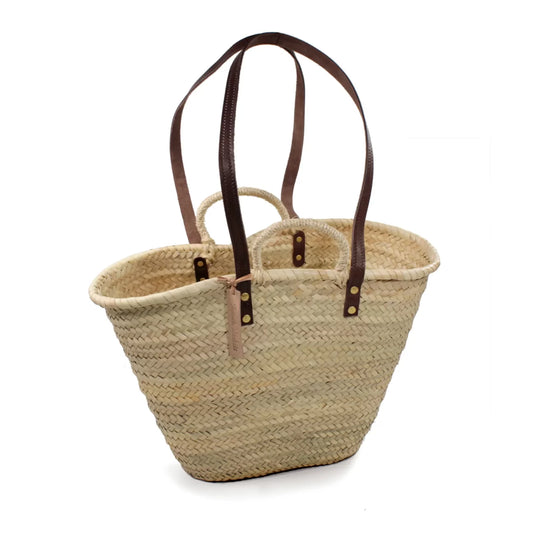 Double Handle Straw market basket against white background